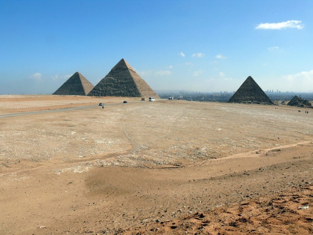 The main tourist attraction of Egypt, the Pyramids. In the background Cairo’s buildings